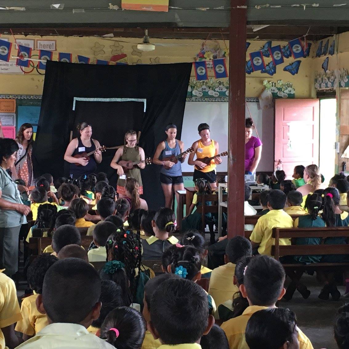 volunteers playing ukelele